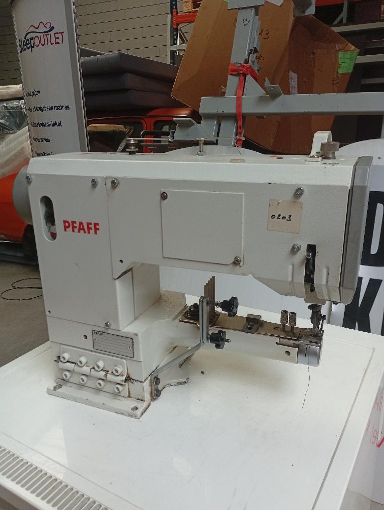 Naaimachine industrie, Ophalen