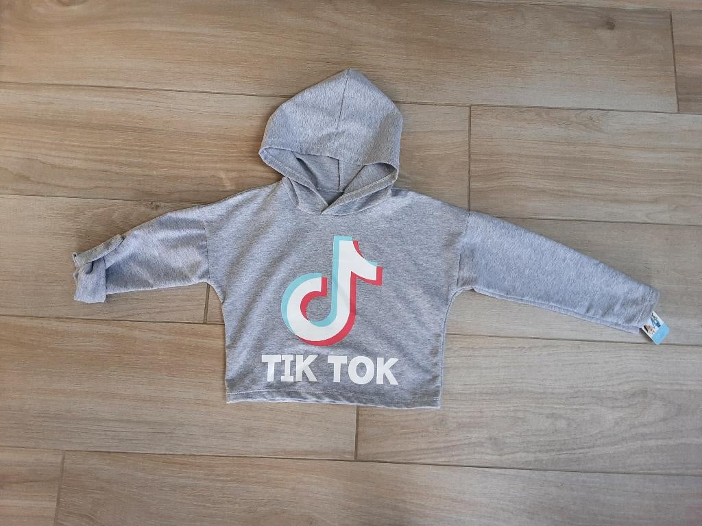 Nieuw met label: Trui maat 6 jaar *Tik Tok*, Meisje, Nieuw, Ophalen of Verzenden, Shirt of Longsleeve