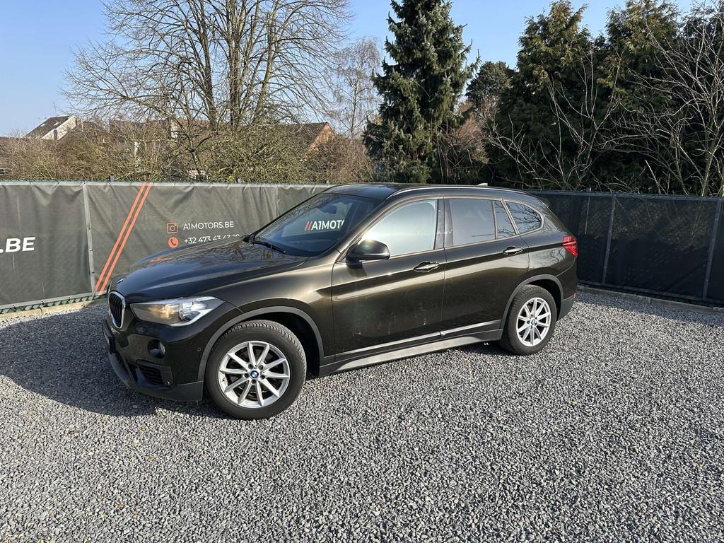 BMW X1 BENZINE | AUT | AIRCO | NAVI, Auto's, BMW, Gebruikt, Zwart, Leder, 3 cilinders