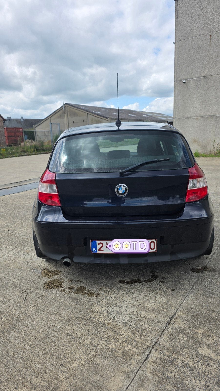 Bmw serie 1 116i 2006, Auto's, Achterwielaandrijving, Zwart, 4 cilinders, Leder