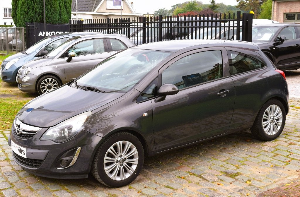 Opel Corsa 1.4i/GPS/LEDER/HISTORY/GARANTIE, Auto's, Voorwielaandrijving, Euro 5, Zwart, 4 cilinders