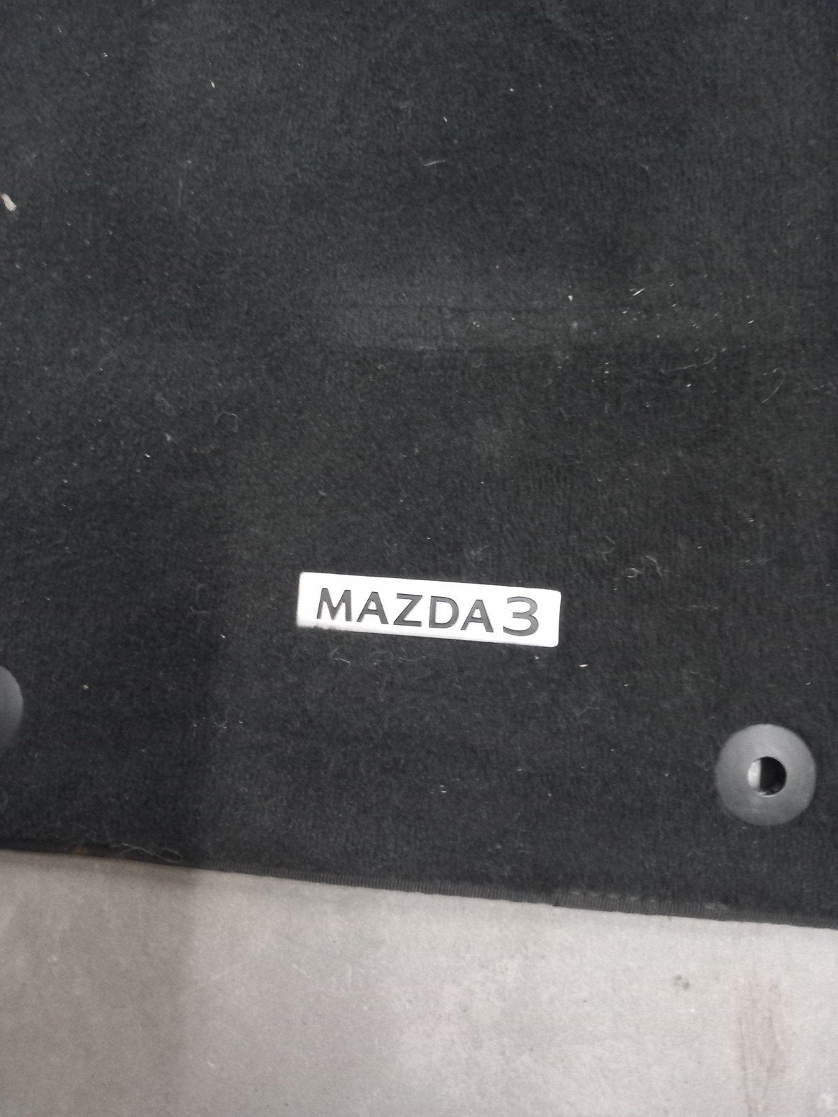 Mazda 3 automatten, Ophalen