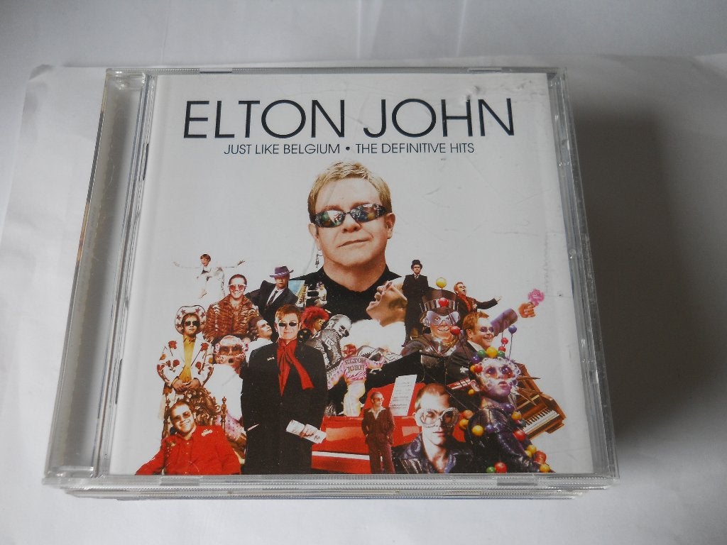 CD - ELTON JOHN - JUST LIKE BELGIUM  - DEFINITIVE HITS, Pop, Ophalen of Verzenden, Zo goed als nieuw, Verzamelalbum