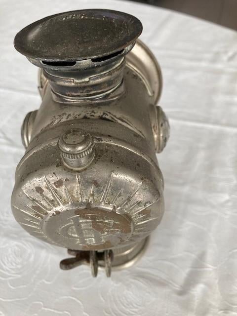 carbuurlamp (fietslicht), Enlèvement