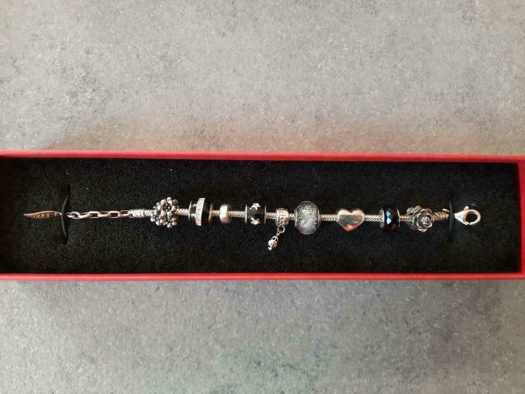 Amore & Baci armband, Handtassen en Accessoires, Armbanden, Ophalen, Met bedels of kralen, Zo goed als nieuw, Zilver