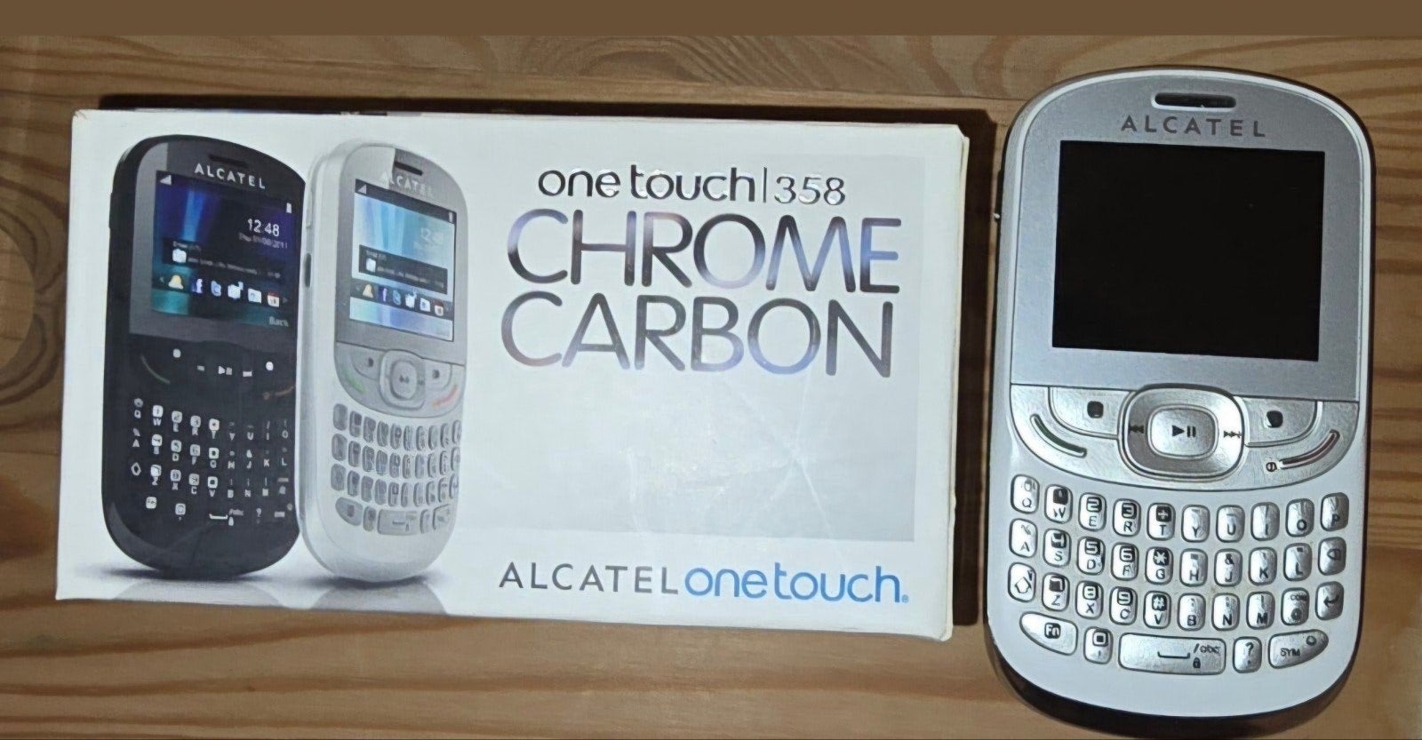 Alcatel One Touch 358 Chrome Carbon - zo goed als nieuw, Telecommunicatie, Ophalen of Verzenden, Zo goed als nieuw, Zonder abonnement