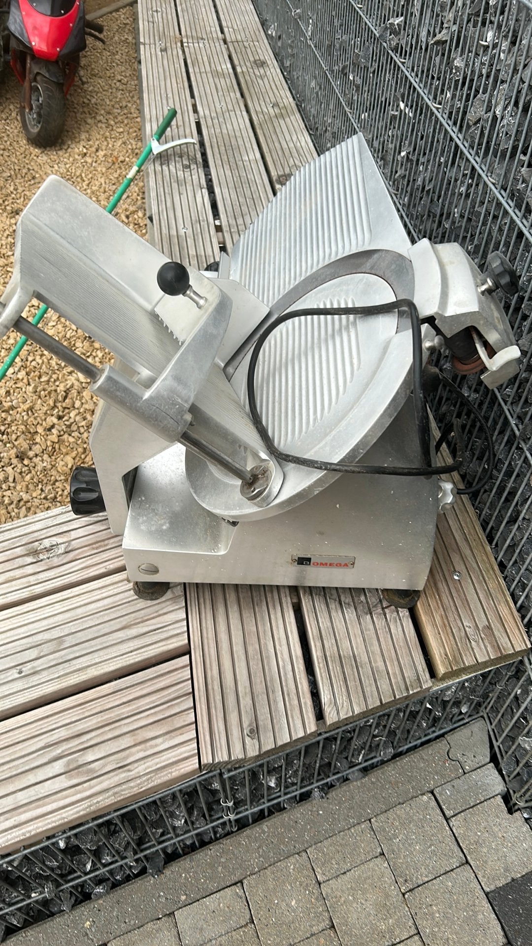 vleessnijmachine, Ophalen