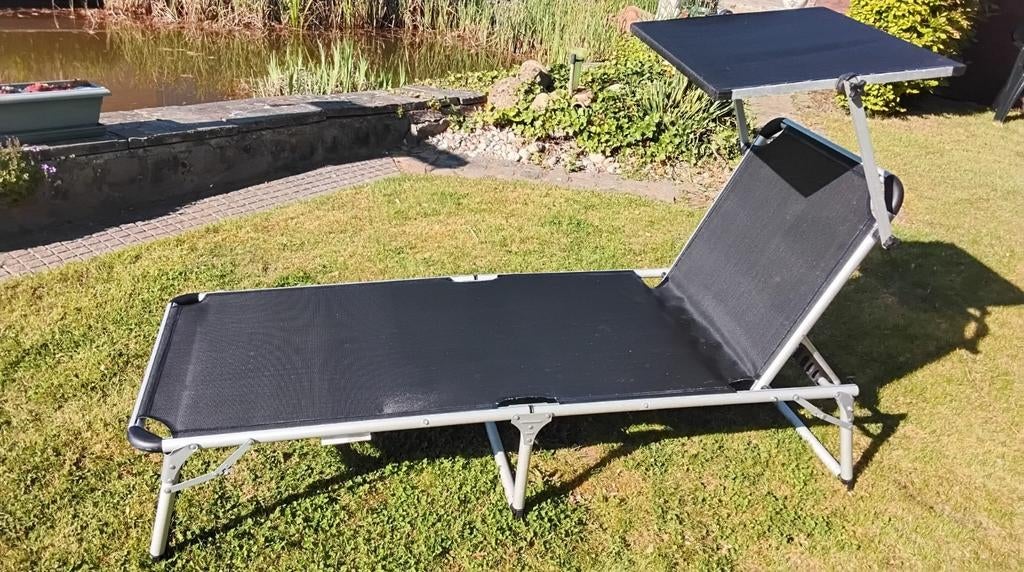 Ligzetel met zonnekap, Ophalen