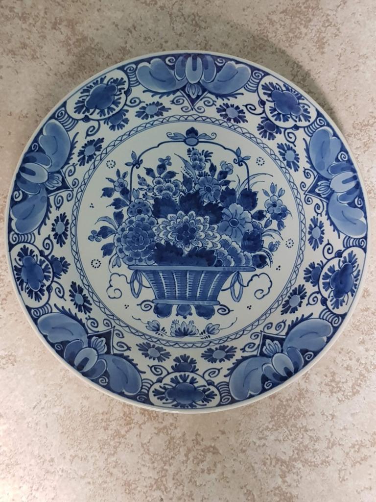 Delfst blauw bord, Ophalen
