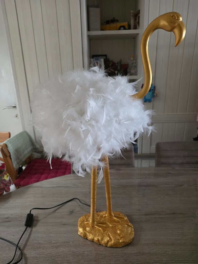 Flamingo lamp, Ophalen