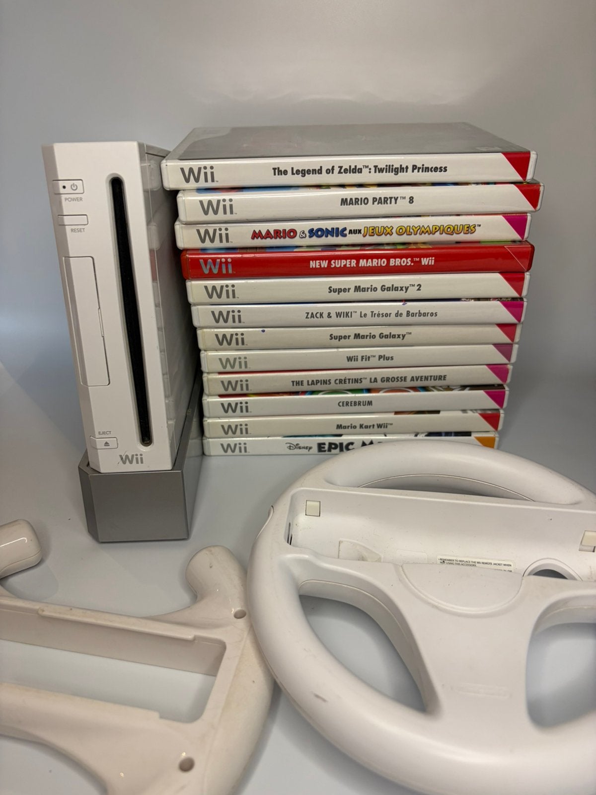 Nintendo Wii + 12 jeux (Zelda, Mario Galaxy…) + 2 volants, Enlèvement ou Envoi, Utilisé, Sans contrôleur, Avec jeux
