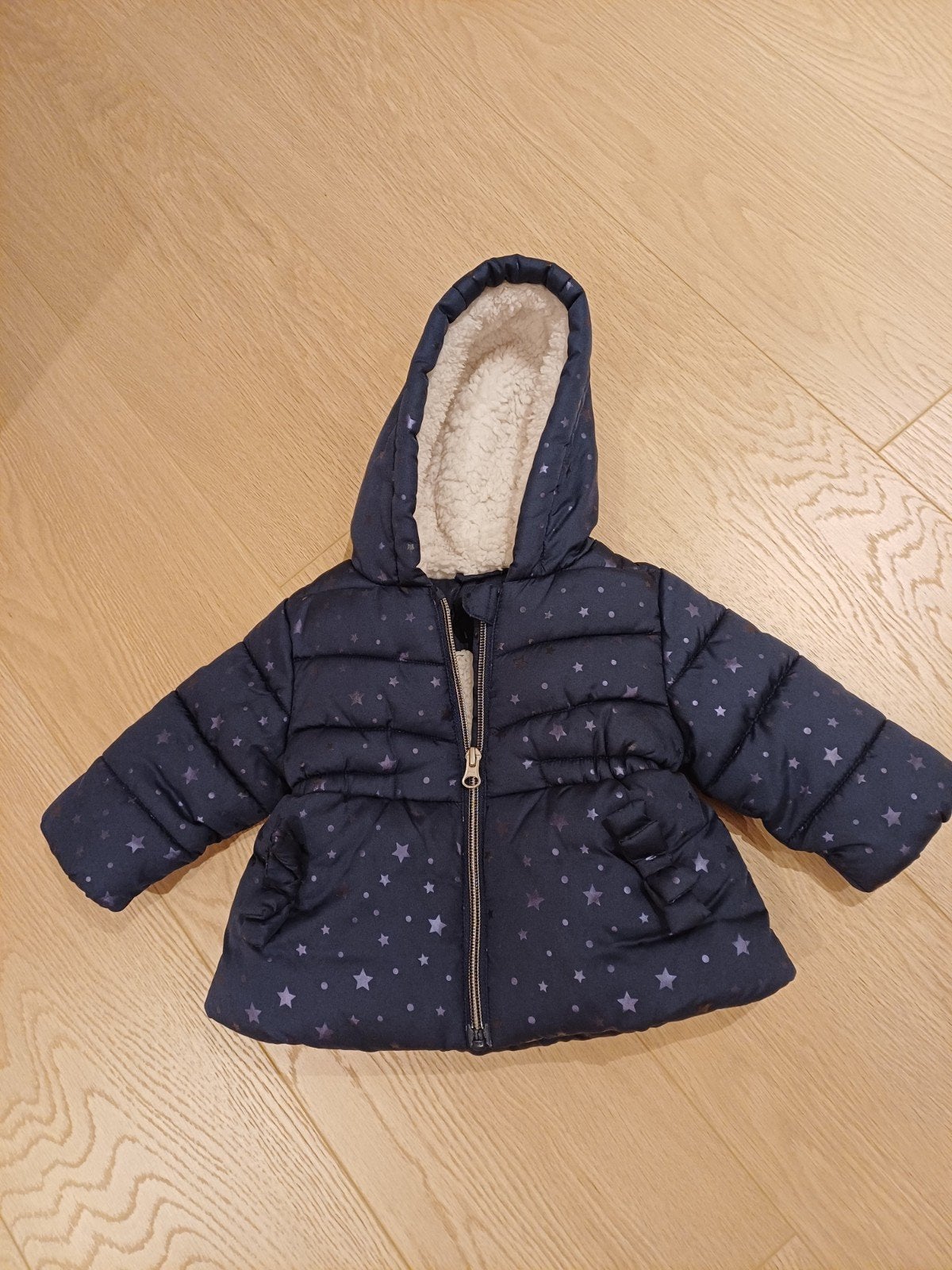 Winterjas baby, Ophalen