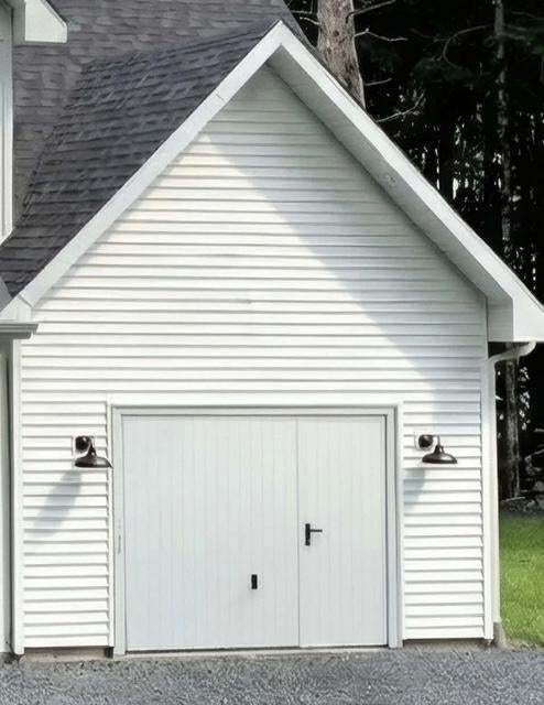 Porte de garage en PVC avec portillon