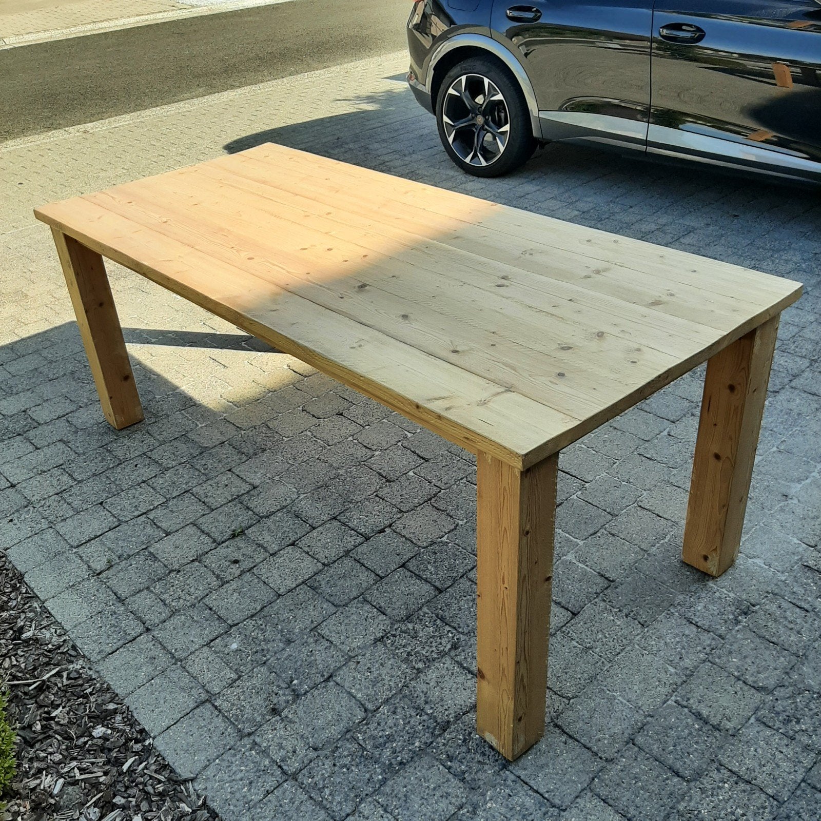 Zware houten eettafel, Ophalen
