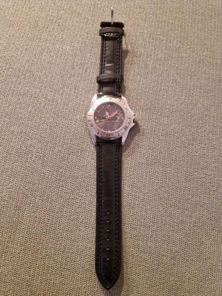 Montre analogique Loctite F1, McLaren-Mercedes, Bijoux, Sacs & Beauté, Montre-bracelet, Autres marques, Enlèvement ou Envoi, 1960 ou plus tard