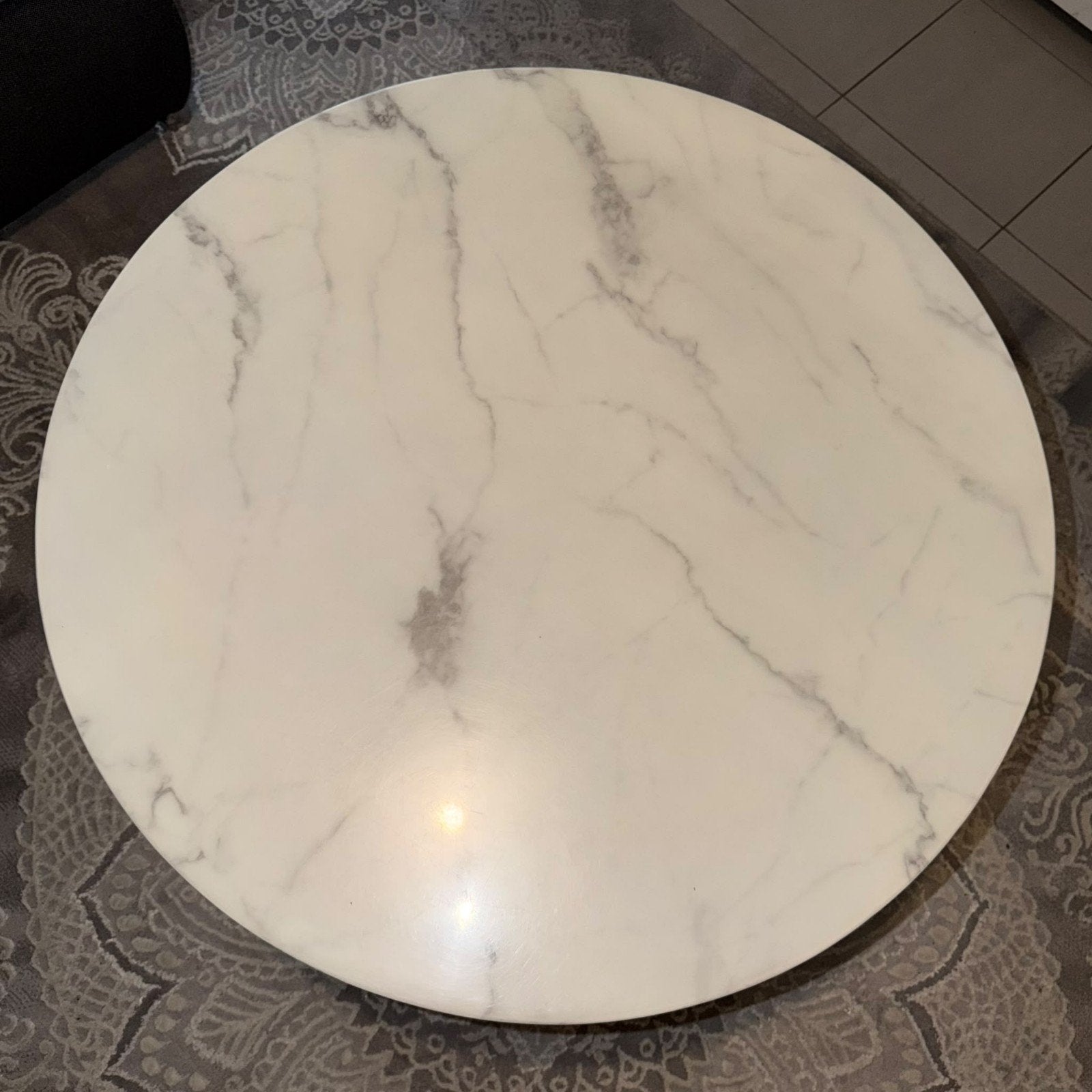table ronde en marbre, Enlèvement