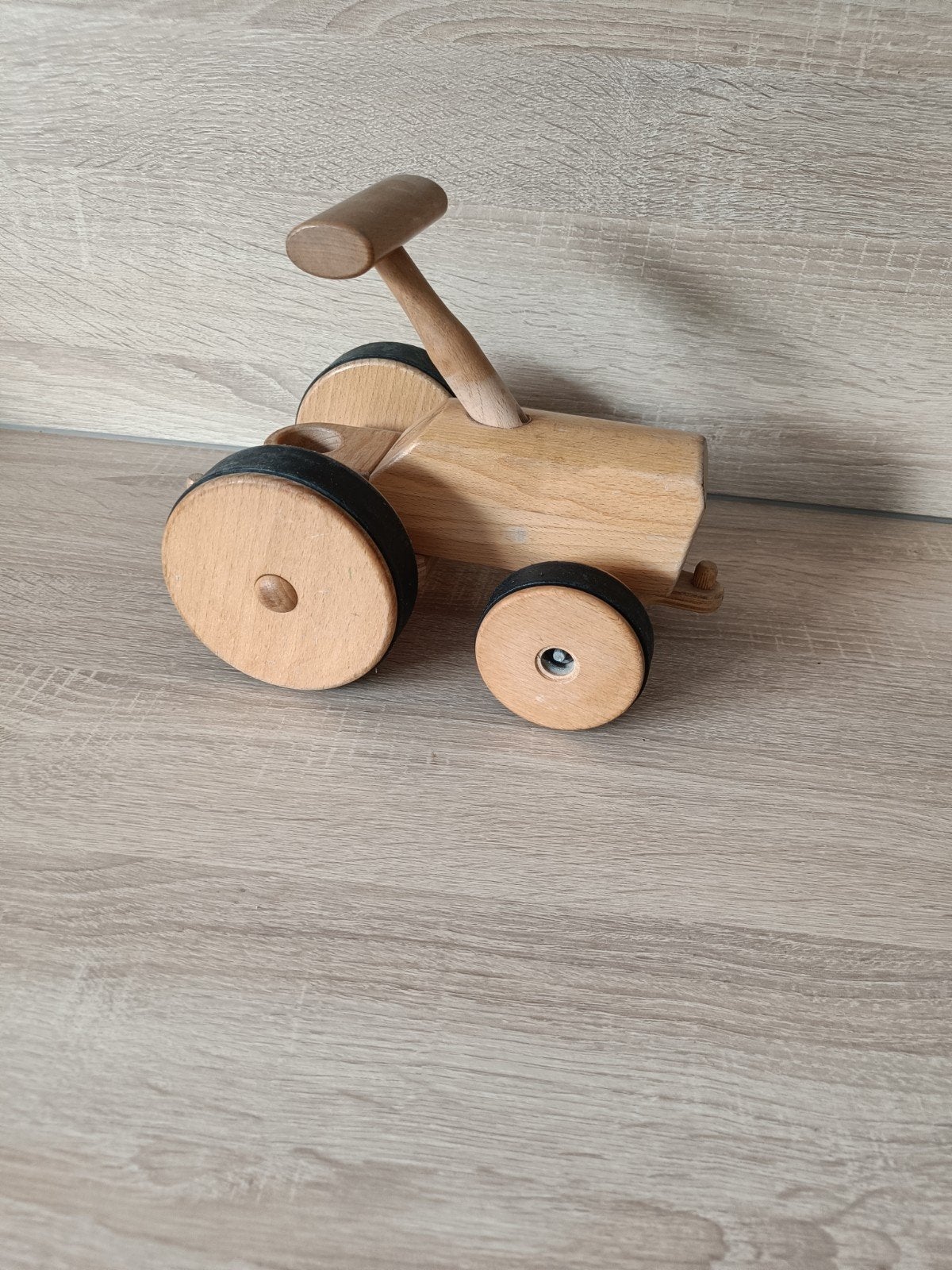 houten traktor van het merk Nic, Ophalen