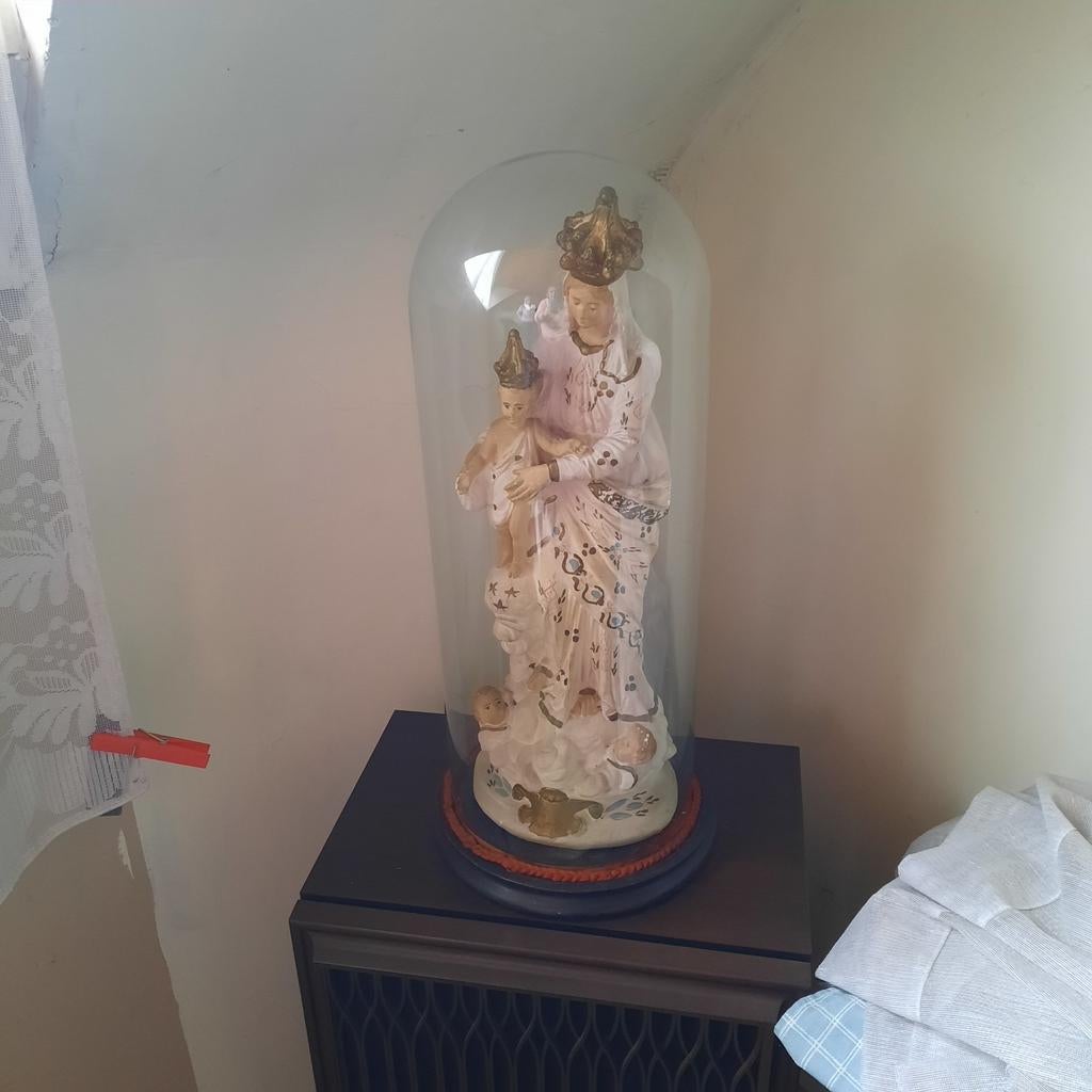 Mariabeeld met stolp, Ophalen
