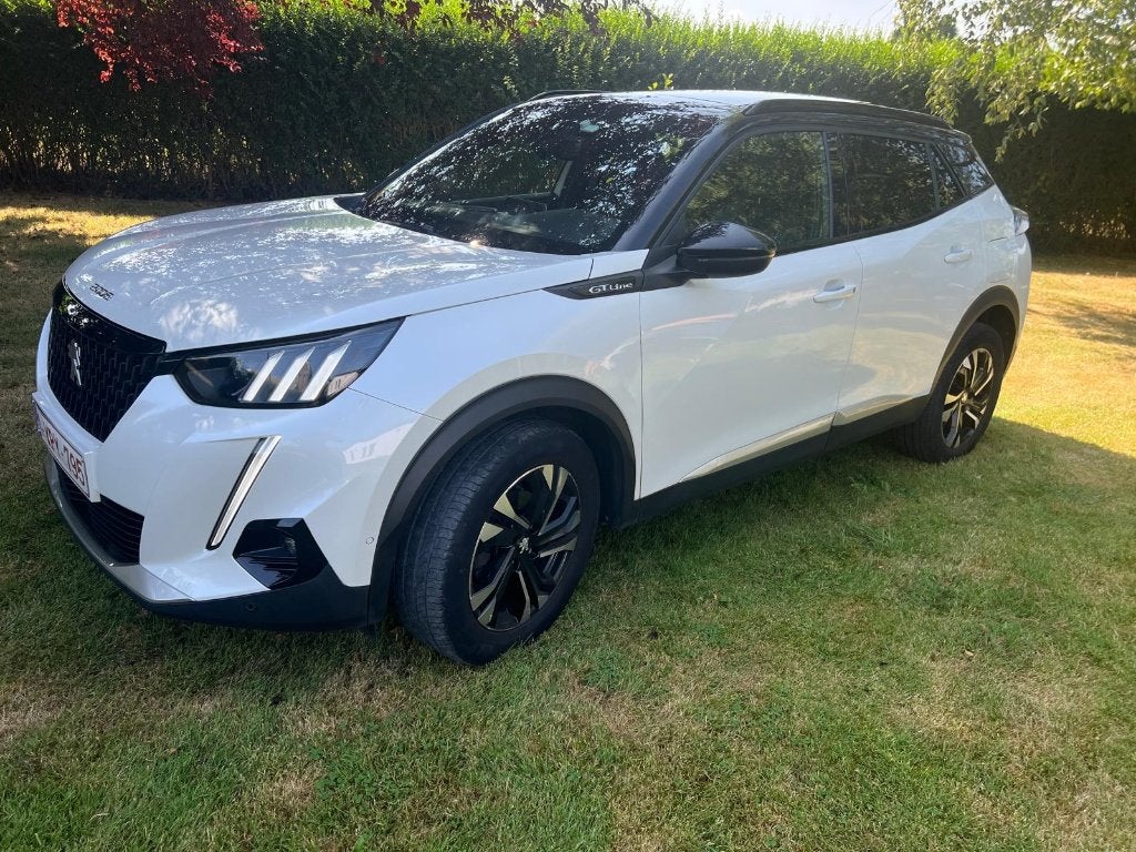 Peugeot 2008 GT Line 1.2 PureTech 130pk — volledige opties, Auto's, Voorwielaandrijving, 1199 cc, Leder en Stof, Wit