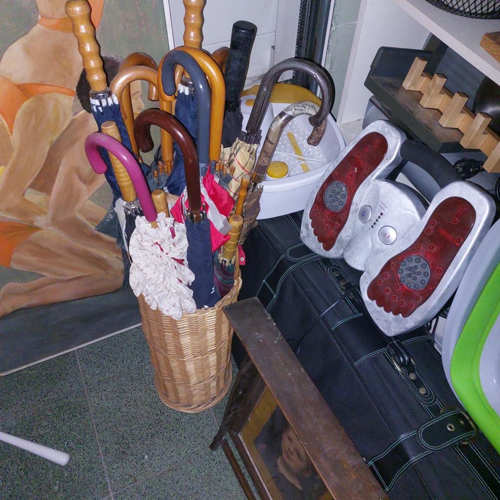 15 tal paraplu s met paraplubak, Ophalen