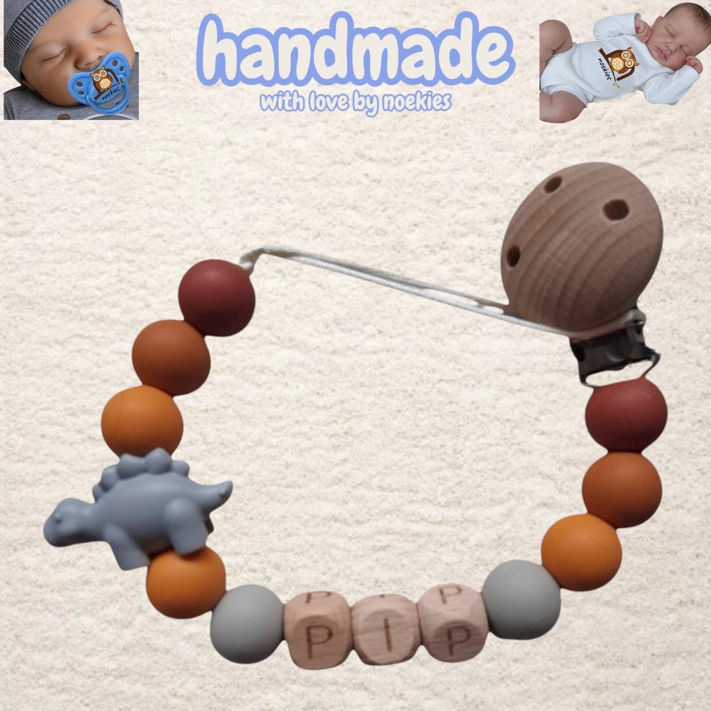 Attache tétine Noekies Name Dino gris orange n 4, Enlèvement ou Envoi, Neuf, Cadeau d'accouchement