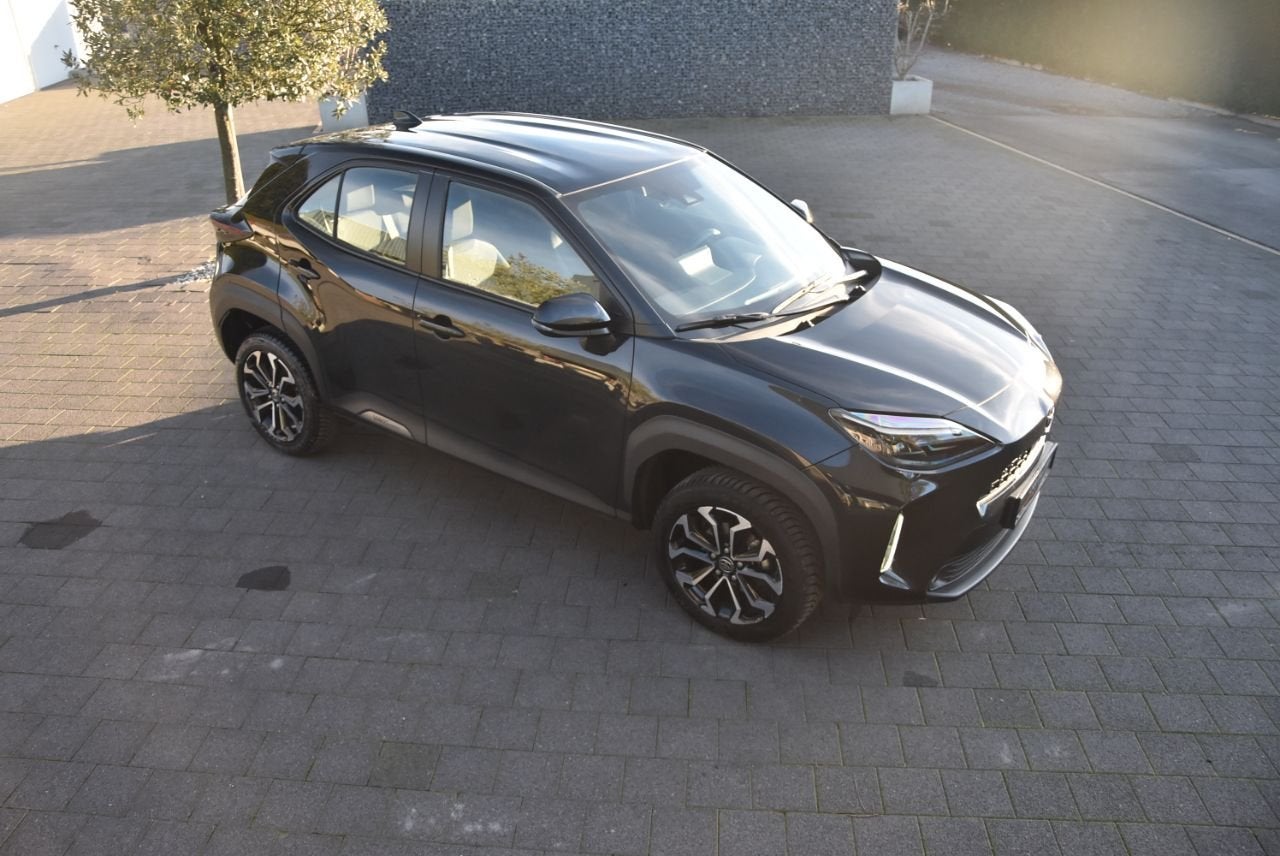 Toyota Yaris Cross 1.5 Hybrid Dynamic Plus Cam/Navi/Zetelver, Auto's, Toyota, Stof, Gebruikt, Zwart, 1490 cc