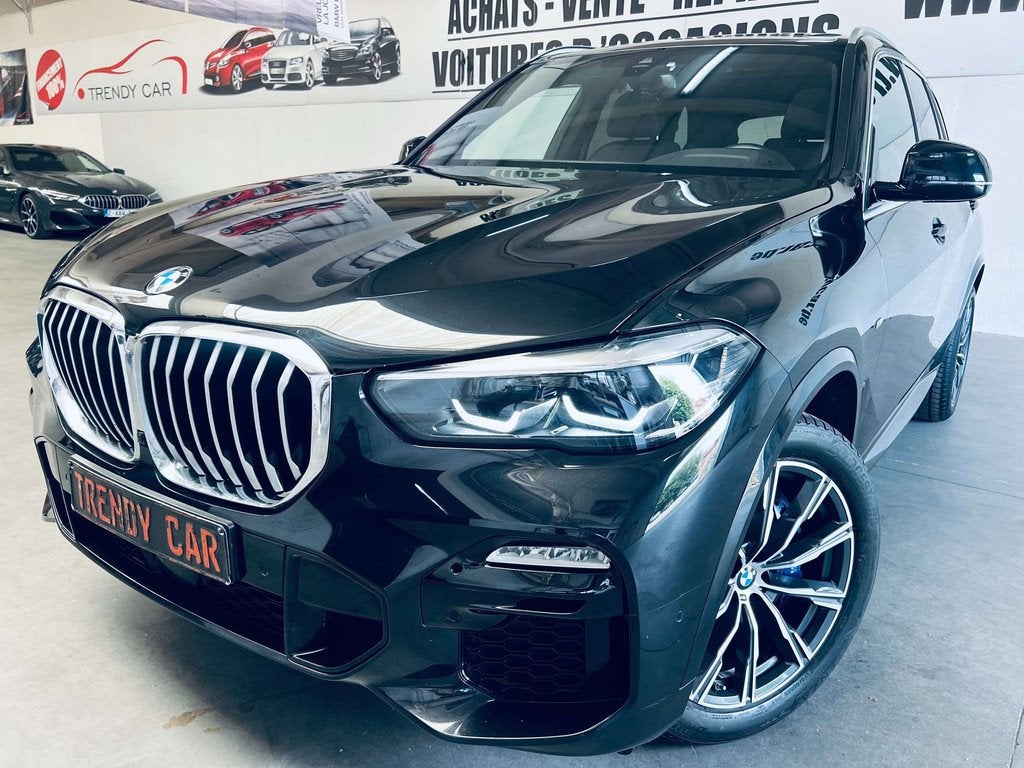 BMW X5 xDrive30d MHEV+PANO+ACC+CAMERA+CARNET+GARANTIE, Auto's, BMW, Automaat, Gebruikt, 2993 cc, Zwart