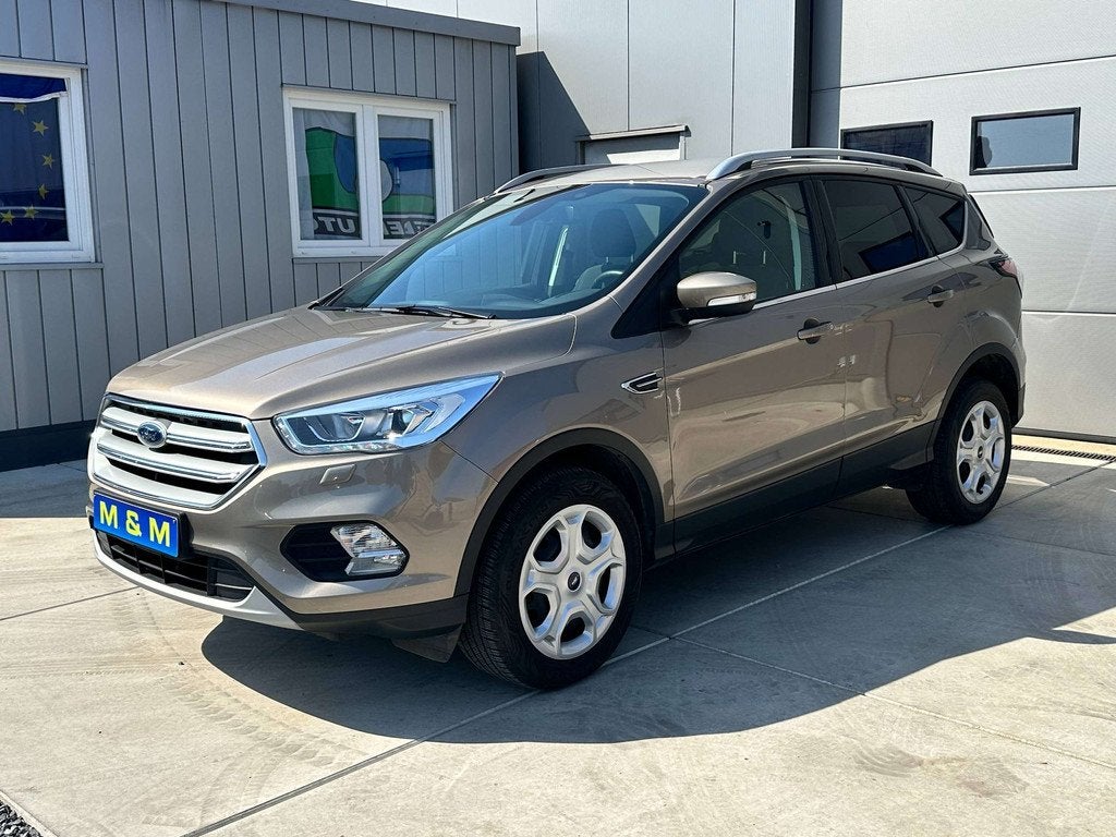 Ford Kuga Kuga 1.5 EcoBoost FWD Business Edition * 12M Gara, Auto's, Stof, 4 cilinders, Lichtsensor, Bedrijf