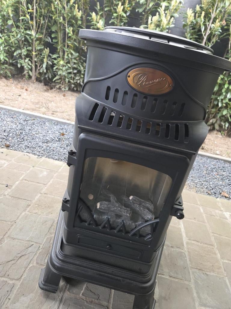 Gietijzeren verplaatsbare gaskachel met gasfles. Nieuwstaat, Ophalen, Gaskachel