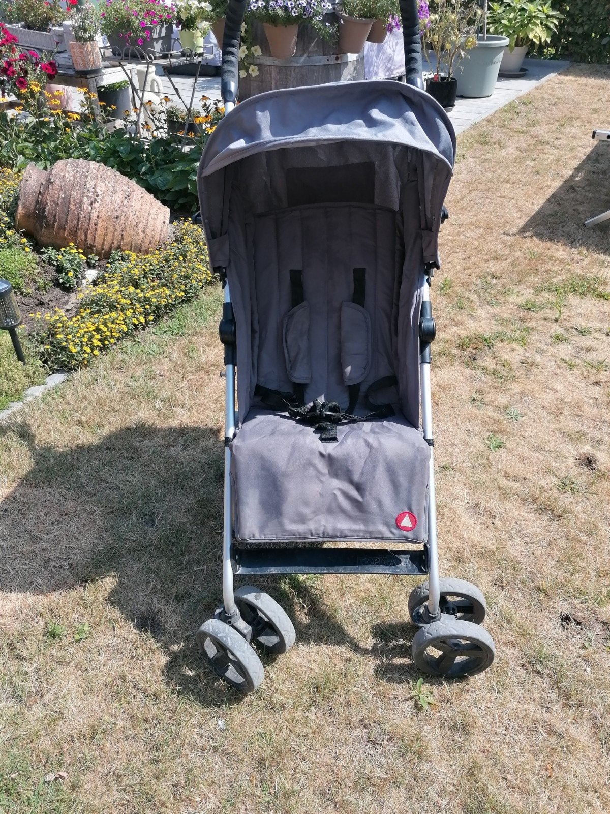Plooibare grijze buggy, Ophalen, Voetenzak