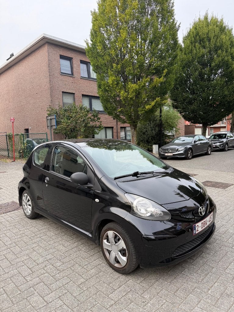 Toyota Aygo (Benzine) Manueel – 2011, Auto's, Toyota, Euro 5, Zwart, Zwart, Handgeschakeld