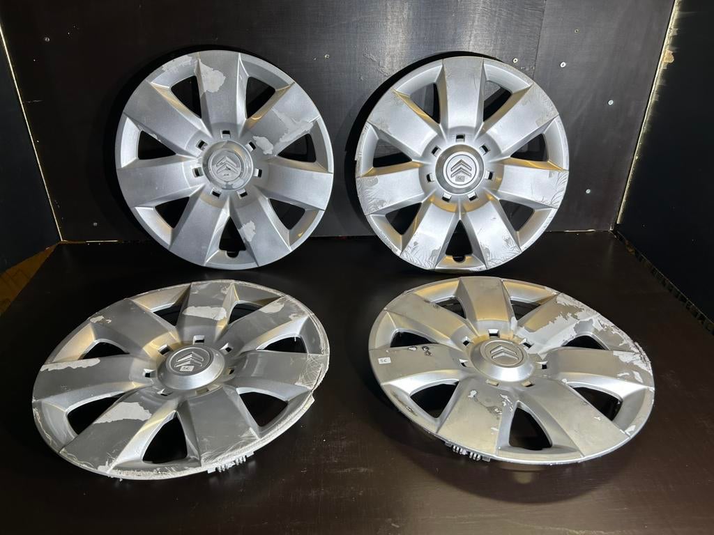 4 originele Citroën berlingo 15" wieldoppen, Ophalen of Verzenden, Gebruikt