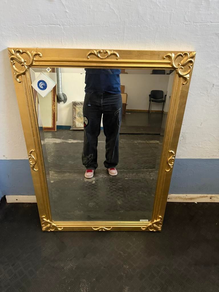 Grote gouden spiegel, Ophalen