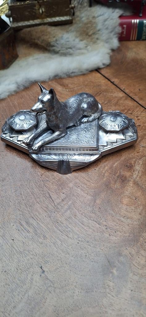 Art deco inktpot, Ophalen