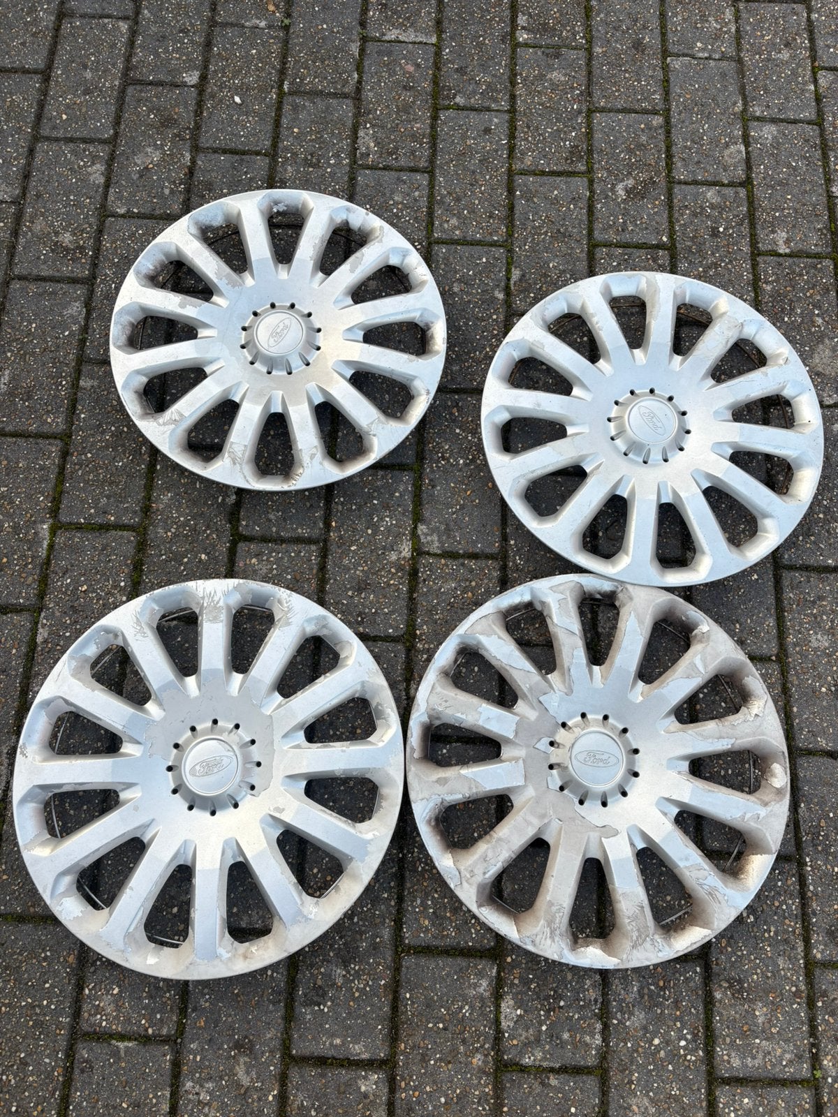 4 wieldoppen ford fiesta 15 inch, Ophalen, Zo goed als nieuw