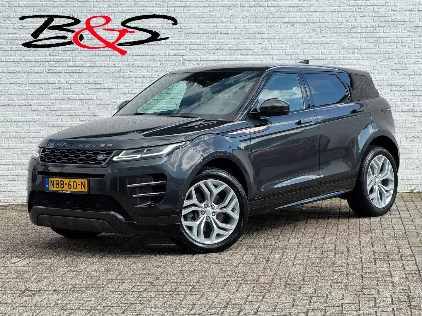 Land Rover Range Rover Evoque 2.0 P200 AWD R-Dynamic HSE 2x, Auto's, Automaat, Zwart, Bedrijf, Verwarmde buitenspiegels