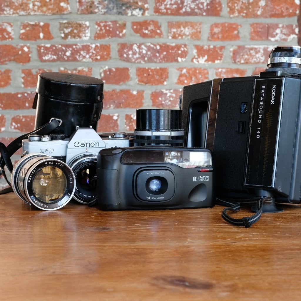 Set zilveren camera's en accessoires, Ophalen, Niet werkend, Spiegelreflex, Canon
