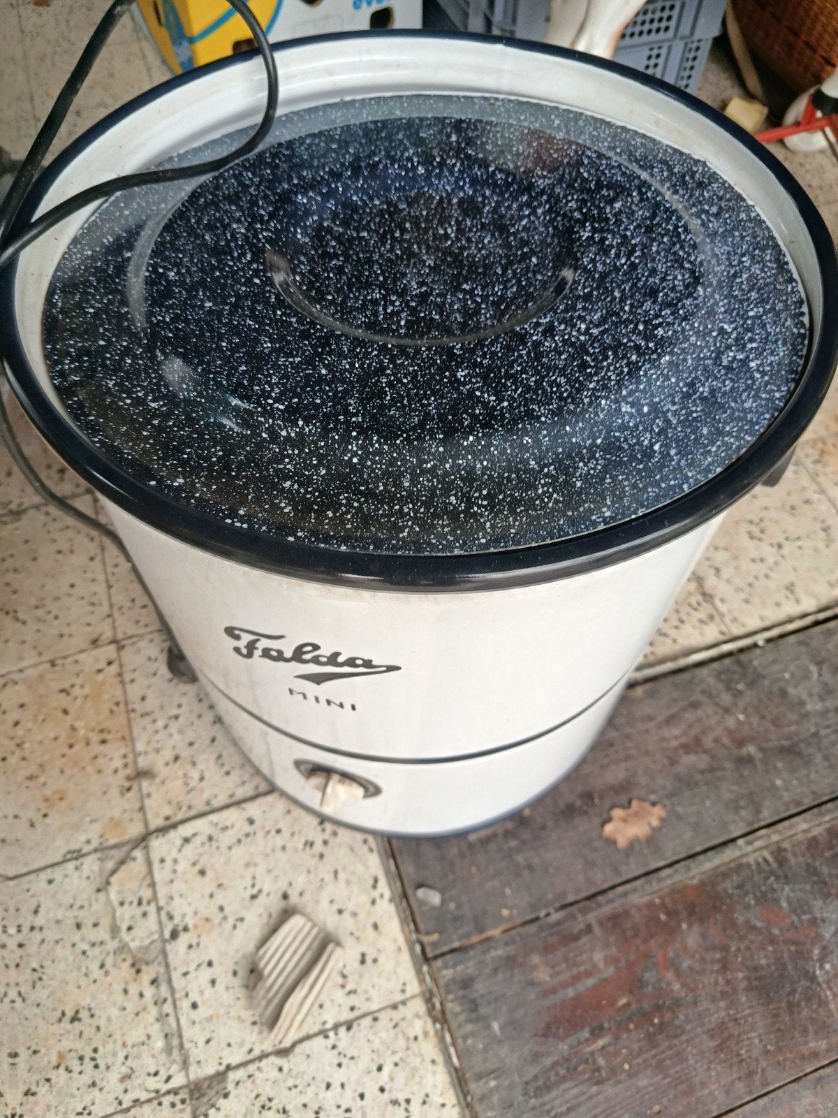 mini wasmachine, Enlèvement