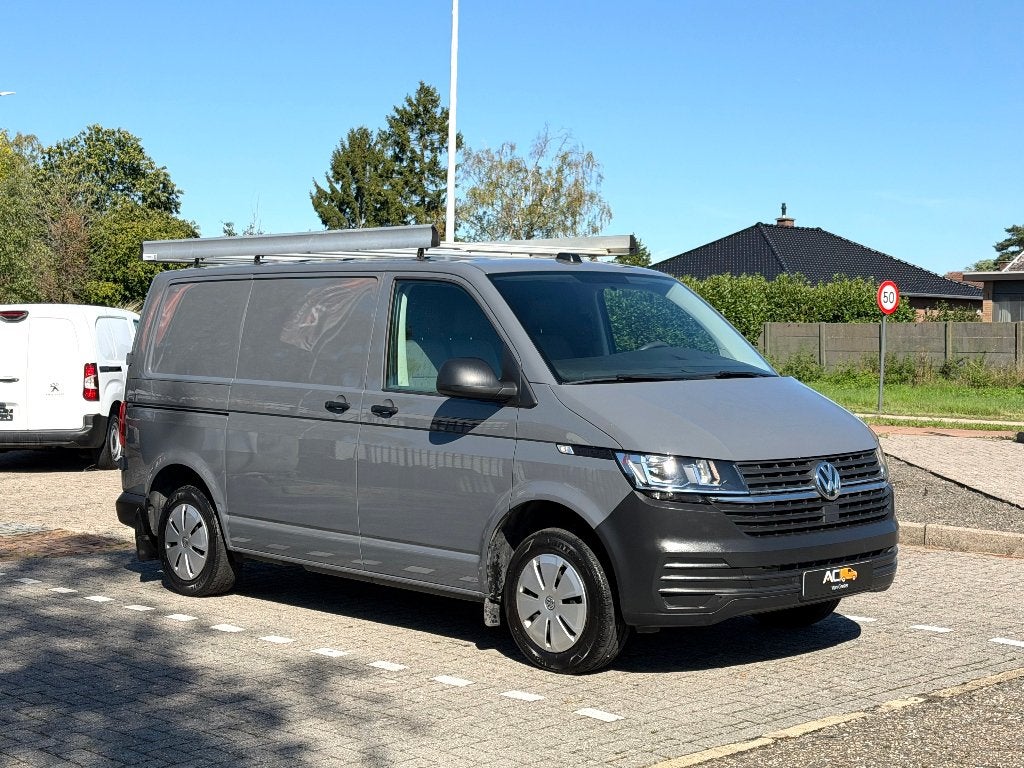 ✅VW T6.1 Transporter 2.0TDI Airco/Navi/GARANTIE/Cruise/Trek., Auto's, Voorwielaandrijving, Dealer onderhouden, Stof, Euro 6