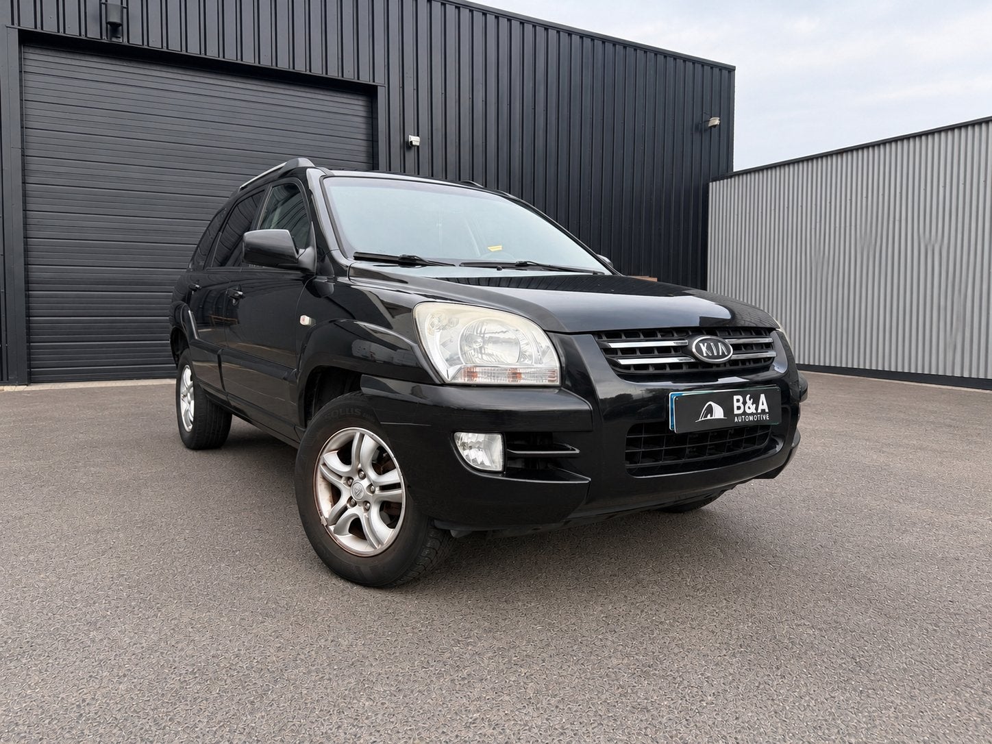 Kia Sportage 2.0 diesel automaat, Auto's, Gebruikt, Zwart, Zwart, Leder