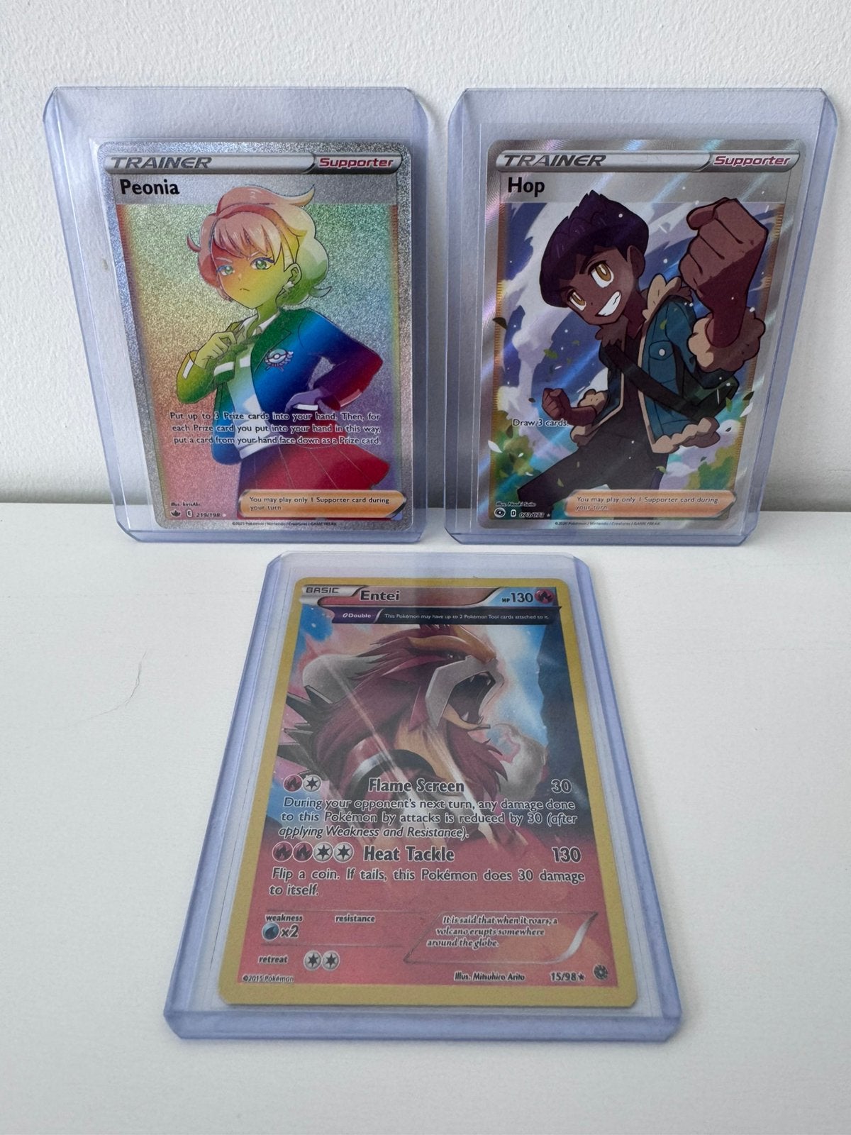 3 speciale Pokémon kaarten Hop 73/73 Peonia 219/198 Entei 15, Ophalen of Verzenden