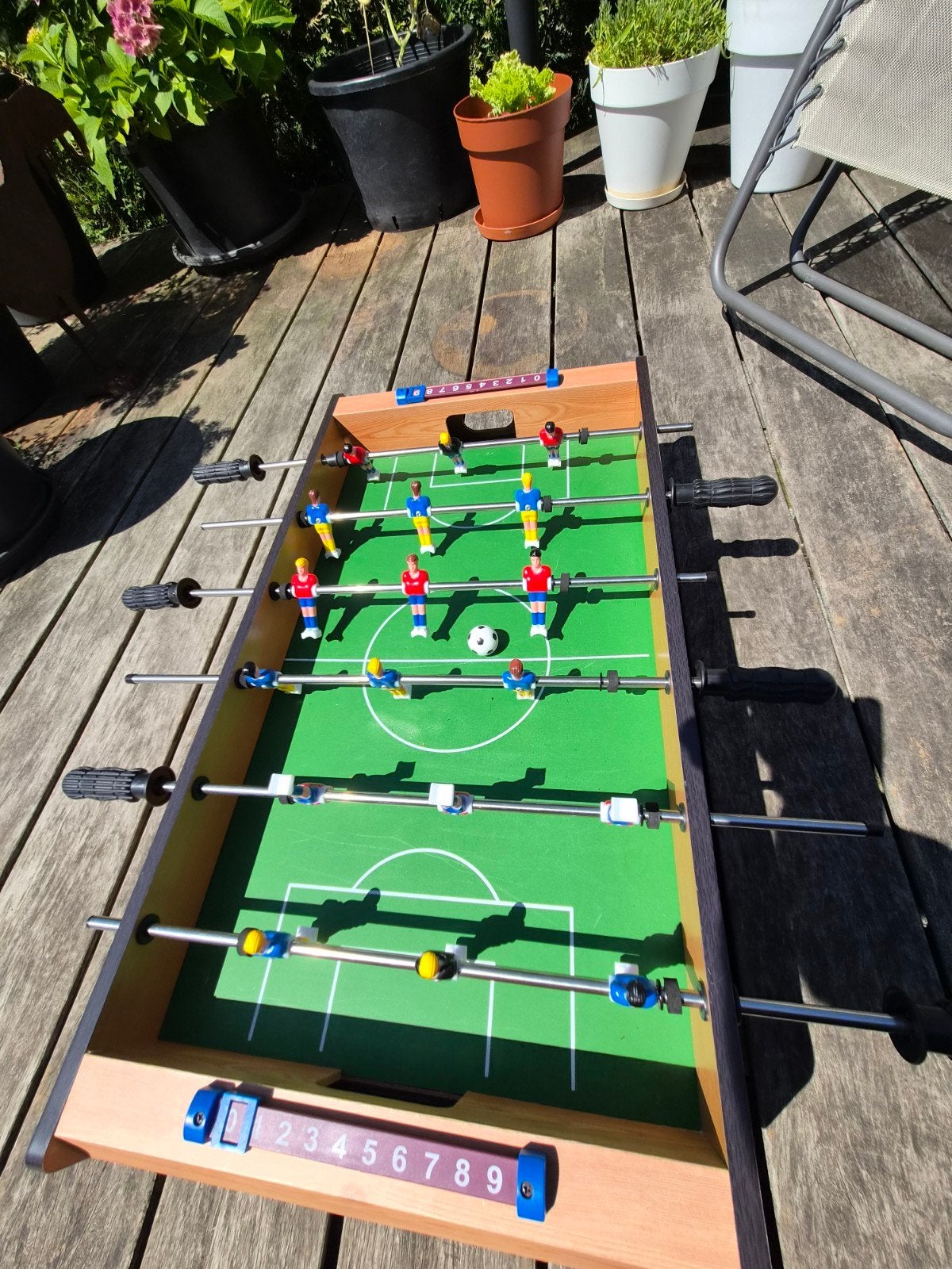 Tafelvoetbalspel nieuw, Ophalen