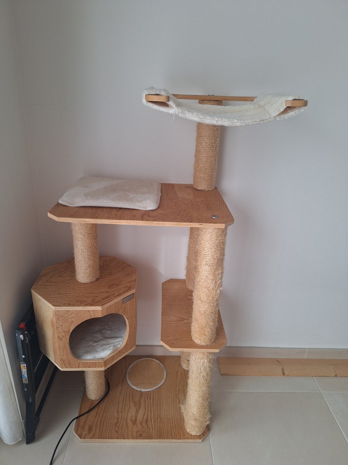 Arbre à chat, Ophalen
