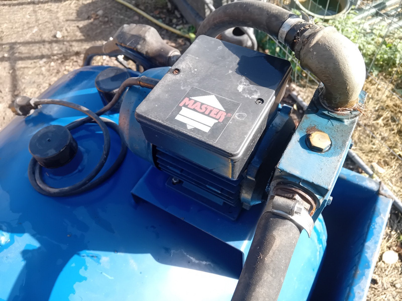 mazoutton met elektrische pomp, Ophalen