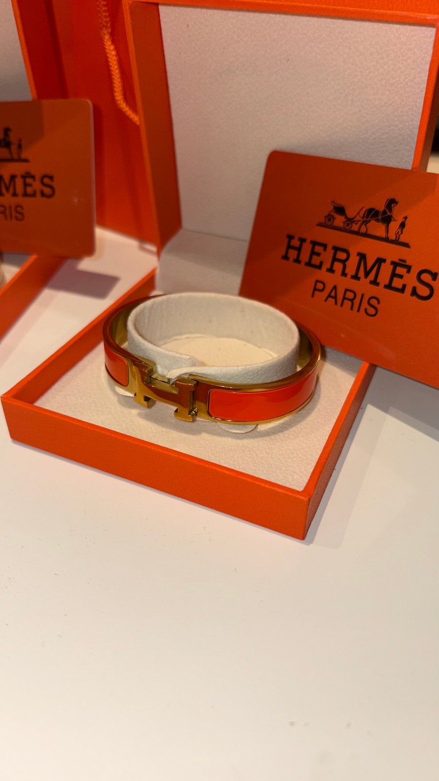 Armband Hermes clic h - oranje - 1:1!, Ophalen of Verzenden, Zo goed als nieuw, Oranje