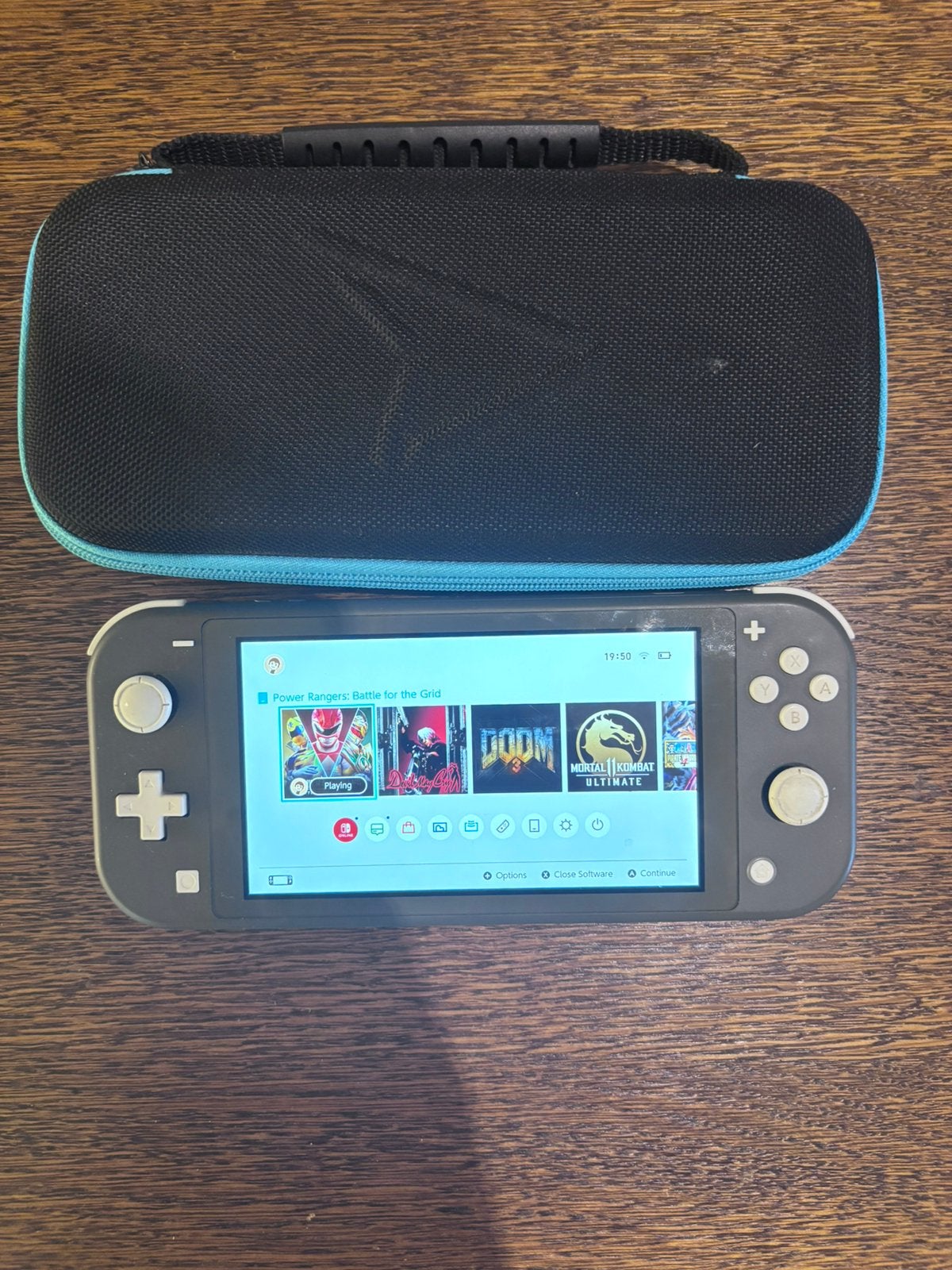 Nintendo switch lite, Ophalen of Verzenden, Grijs, Zo goed als nieuw, Met beschermhoes of tas