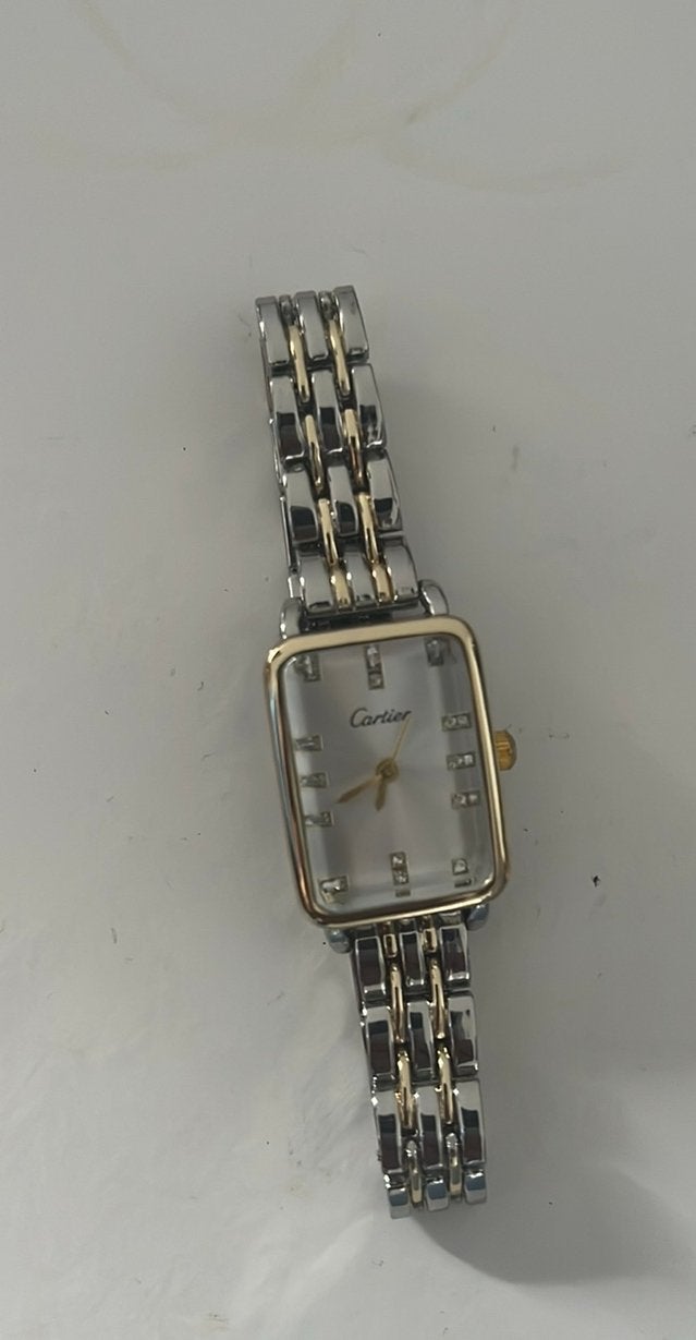 Cartier horloge dames – zilver/goudkleurig – rechthoekig, Ophalen of Verzenden, Zo goed als nieuw