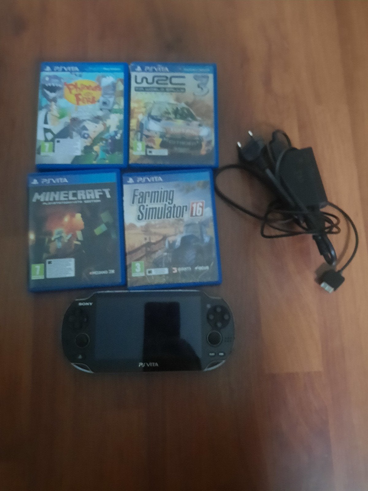 psvita met 4 games en oplader, Ophalen