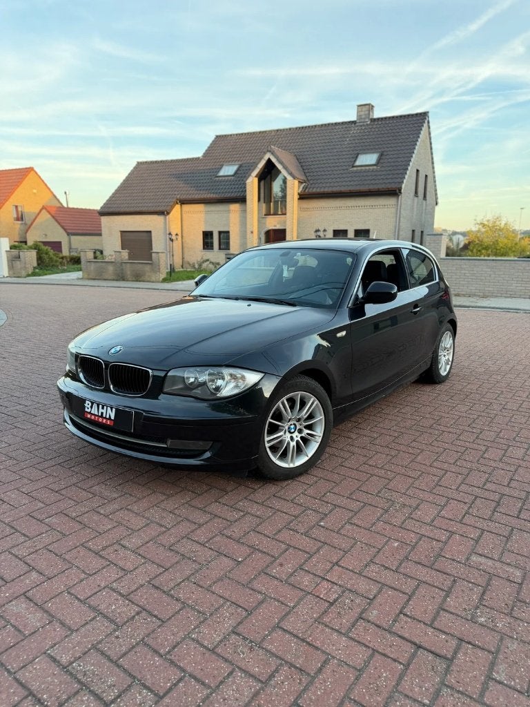 BMW 1-serie (143.000 KM), 1 Reeks, Zwart, Bedrijf, https://public.car-pass.be/vhr/2c18ec5c-e2fb-452a-9a1d-3eac93c1532d