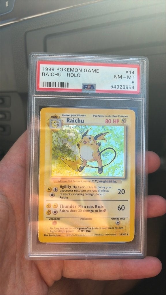 Pokémon Raichu Holo 14/102 Base Set 1999 – PSA 8, Hobby en Vrije tijd, Verzamelkaartspellen | Pokémon, Ophalen of Verzenden, Zo goed als nieuw